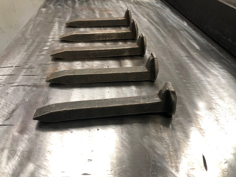 track spikes on concrete