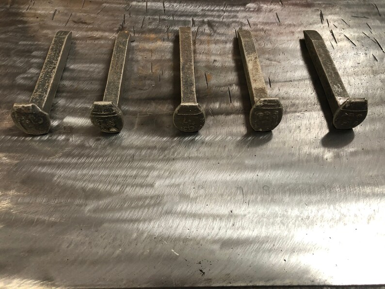 track spikes on concrete