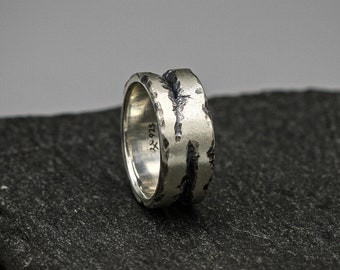 Zilveren crackring, breukband, brutalistische stijl