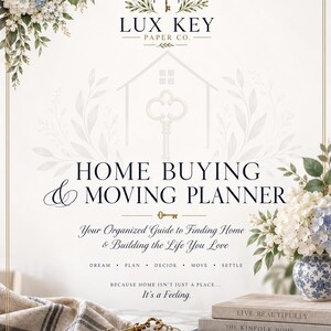 May include: A Home Buying & Moving Planner by Lux Key Paper Co. featuring a white cover with floral accents, a gold key charm, and text including 'Your Organized Guide to Finding Home & Building the Life You Love' and 'Because home isn't just a place... It's a Feeling.'