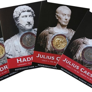 May include: Four cards with images of Roman emperors and coins. The cards are red and black with white text. The text on the cards reads "Hadrian", "Julius Caesar", and "Reproduction Roman Coin".
