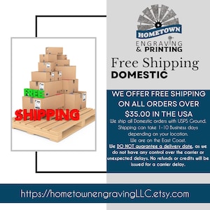 Free shipping announcement from Hometown Engraving and Printing, highlighting free domestic shipping on orders over $35. The image features stacked shipping boxes on a wooden pallet with bold & FREE SHIPPING text. Additional details mention USPS Ground shipping times and a disclaimer about potential carrier delays. Website link provided for more information and orders.