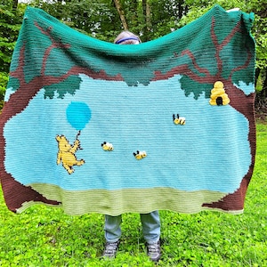 Handmade crochet Winnie-The-Pooh baby blanket with bees and Pooh Bear