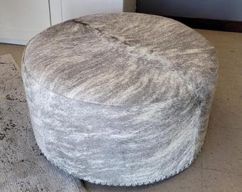 Grey Brindle Round Cowhide Ottoman