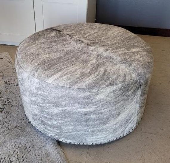 Grey cowhide ottoman discount