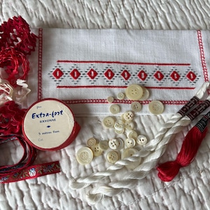 Red and White Vintage French Haberdashery in an Embroidered  Napkin Holder  Pearl Buttons Cotton Thread Ric Rac Trim and Ribbon