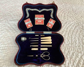 Antique Leather Sewing Case with Sewing and other Tools  25 x 17 x 3 cm