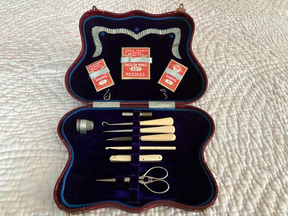 Antique Leather Sewing Case with Sewing and other Tools  25 x 17 x 3 cm