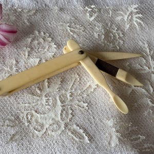 A Victorian Bone Folding Manicure Vanity Set Travelling Manicure Set