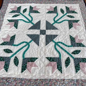 A Vintage French Patchwork and Appliqué Quilted Wallhanging  66 x 65 cm