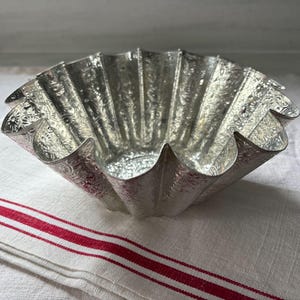 A Vintage French Brioche Tin 21.5 cm Embossed Metal French Baking Tin