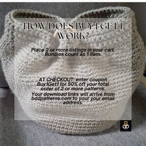May include: A light gray, crocheted basket with the text "HOW DOES BUY 1 GET 1 WORK?" and instructions for a discount. The basket is handmade and has a textured appearance. The text provides details on how to receive a discount.