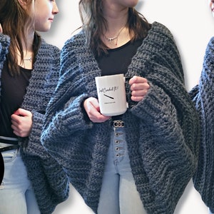 May include: A gray crochet cardigan with a relaxed fit and long sleeves. The cardigan is shown being worn by a person. The text "Easy! Crochet Pattern" is visible in the image.