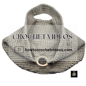 May include: A handmade crochet bag in shades of gray, featuring a circular handle and a wooden ring closure. The bag has the text "CROCHET VIDEOS:" and "howtocrochetvideos.com" on it.