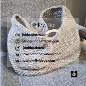 May include: A light gray, hand-knitted bag with a white handle. The bag is made of thick yarn and has a textured appearance. The text "Follow Us:" is visible, along with website and social media information.