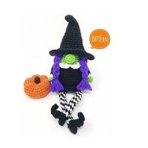 May include: Crocheted witch gnome with purple hair, black hat, and black and white striped legs. The gnome is sitting next to a crocheted orange pumpkin. The text "PATTERN!" is in a speech bubble.