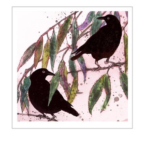 May include: Two black birds perched on a branch with green leaves. The background is a watercolor wash of pink and green.