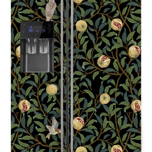 May include: A black refrigerator with a floral design featuring pomegranates, birds, and leaves. The design is in shades of green, yellow, and red.
