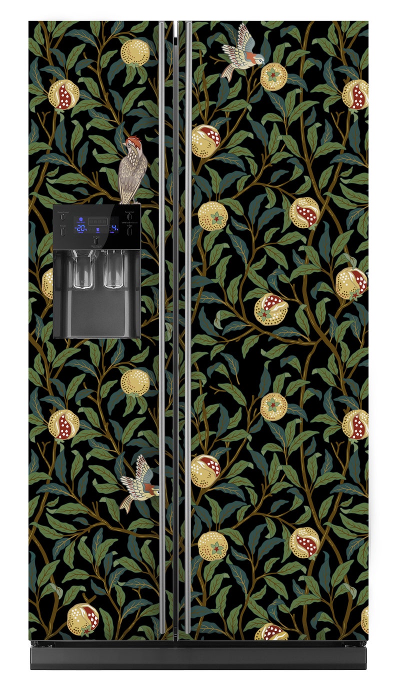 May include: A black refrigerator with a floral design featuring pomegranates, birds, and leaves. The design is in shades of green, yellow, and red.