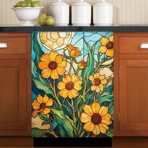 May include: A stained glass style decal featuring yellow flowers with brown centers and green leaves on a blue background. The decal is designed to be applied to a refrigerator or other appliance.