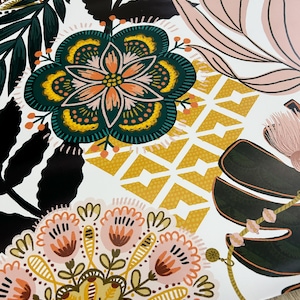 A white fridge wrap pattern of pink, green, yellow, and black floral designs. The pattern features stylized flowers, leaves, and geometric shapes.