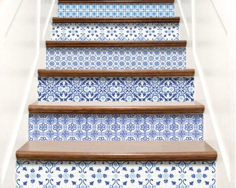 May include: Blue and white patterned stair treads with a traditional tile design. The stair treads are made of wood and have a glossy finish.