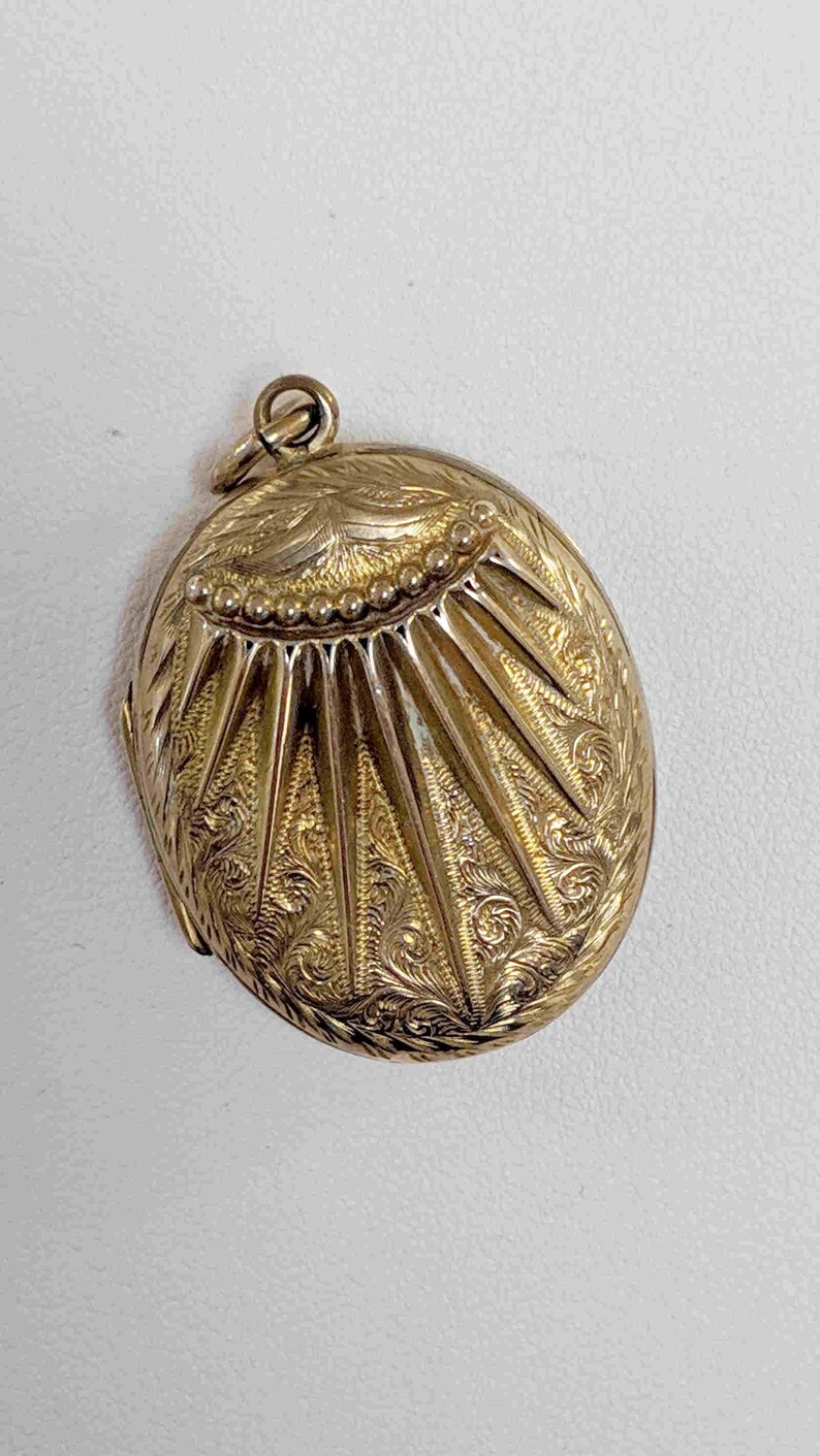 pattern on both sides Antique 9 carat gold sunburst locket