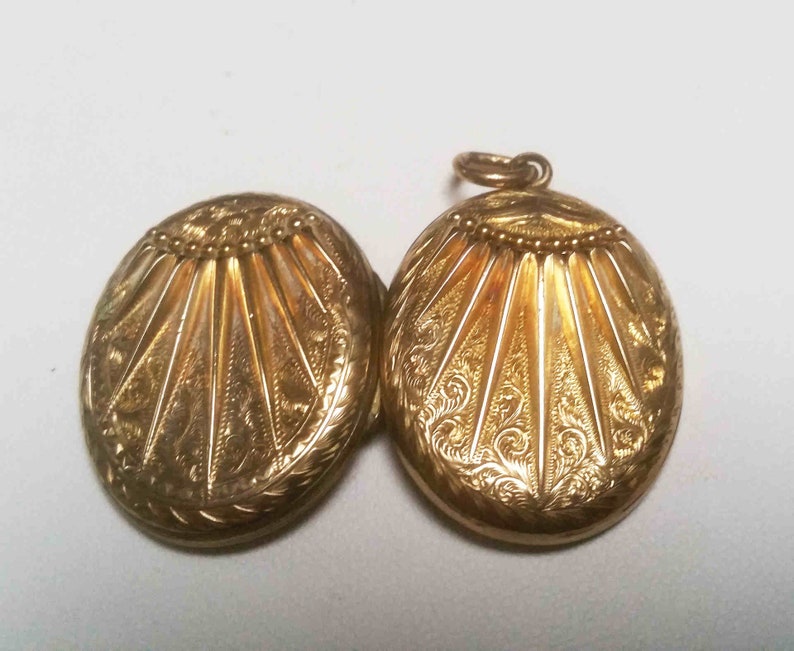 pattern on both sides Antique 9 carat gold sunburst locket