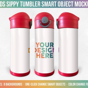 May include: Mockup of a red and white kids sippy tumbler with a lid. The tumbler is a smart object, allowing you to easily add your own design. The text "YOUR DESIGN HERE" is displayed on the tumbler.  The mockup includes 8 backgrounds, one-click change smart objects, and color change features.