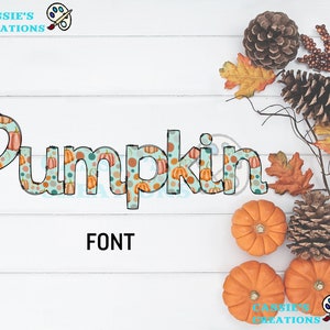 May include: Pumpkin font graphic with a fall theme. The word "Pumpkin" is written in a decorative font with a pattern of orange pumpkins and teal polka dots. The background is a white woodgrain surface with fall decorations.
