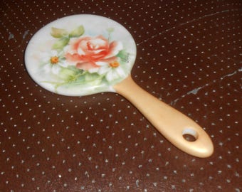 Espejo de muñeca de porcelana antigua