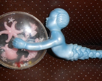 Sonajero de plástico vintage con forma de sirena para bebé