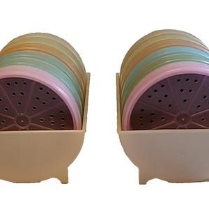 2 Lots of Vintage Tupperware Plastic Pastel Wagon Wheel Coasters Set Of 6 each pastel colors