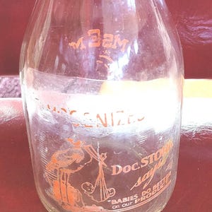 M S Co. Doc Bouteille de lait en verre homogénéisé Stork avec inscription orange