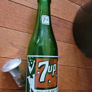 7UP Green Glass Soda Bottle w/Swimsuit Girl Reaching Up