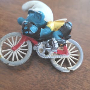 Smurf Cyclist - SOLD AS PICTURED
