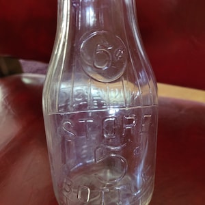 Universal Store 5 Cent Bottle - Pint Milk Bottle - Embossed - Ribbed - Clear Glass