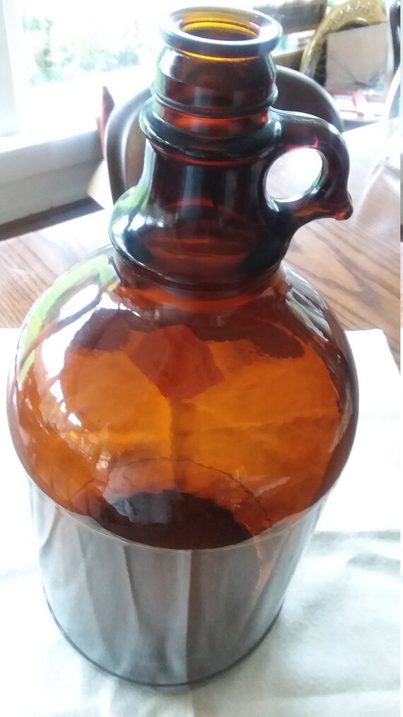 Vintage 1 Gallon Amber Jug Morethebuckles Brown glass jug Owens Illinois Vintage 1940’s Owens Illinois brown glass 1-gallon Duraglas jug