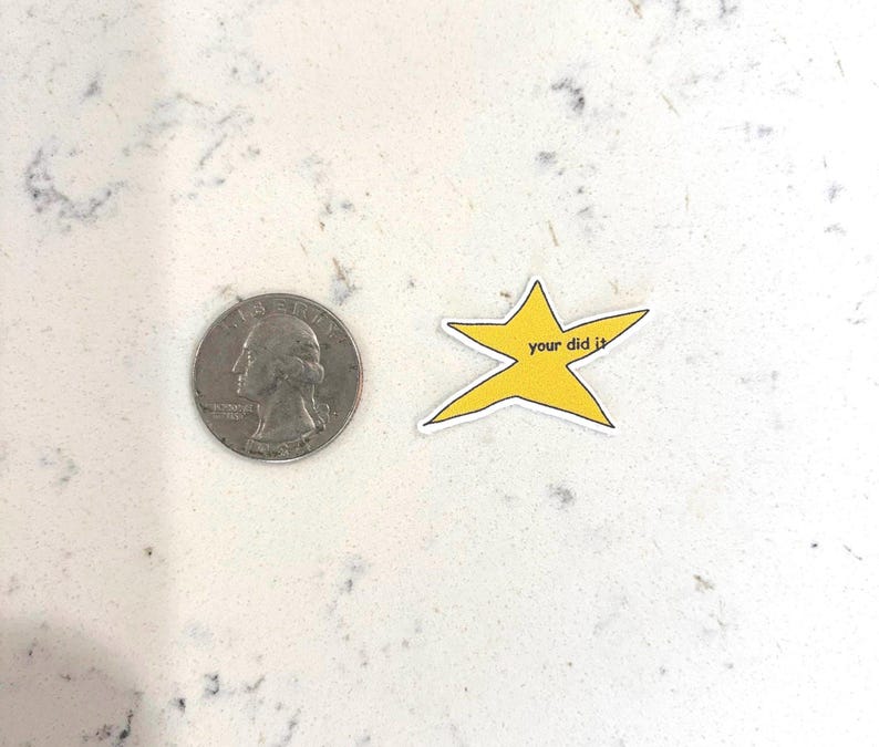 May include: A yellow star sticker with the text "you did it" on a white background.