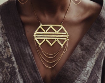 African ethnic geometric necklace in gold plated brass, Unique statement pendant, Black owned jewelry shop Saajie