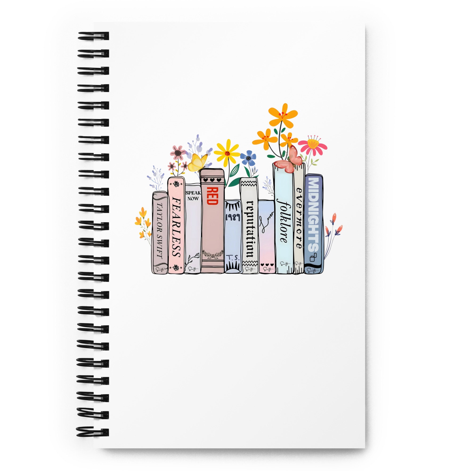 TS Albums Book Stack With Flowers | Music Lovers Journal