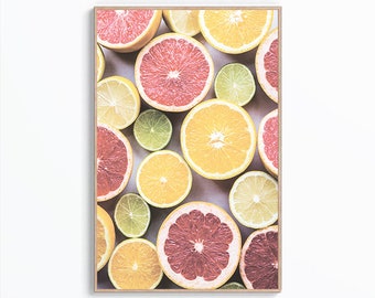May include: A close-up image of a variety of citrus fruits, including grapefruits, oranges, lemons, and limes. The fruits are cut in half and arranged in a circular pattern. The colors are vibrant and the image is bright and cheerful.
