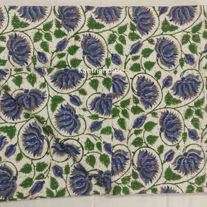 May include: White cotton kantha quilt with a floral pattern in shades of blue, green, and gray. The quilt is hand-stitched and has a traditional Indian design.