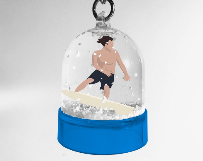 Double-sided snowball keychain of the blond or brown surfer of didouch