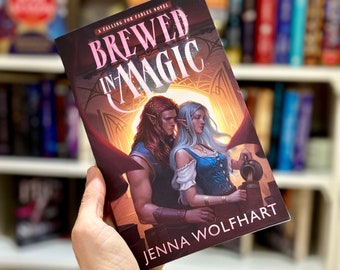 Gesigneerde paperback van Brewed in Magic