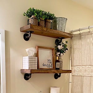 Rustic Heavy Duty Solid Pine Wood Floating shelves with Robust Angled Pipe Brackets.  Great for Bathrooms, Bedrooms, Laundry Room Storage, Kitchens, Study, anywhere you need polished farmhouse and industrial storage and organization.