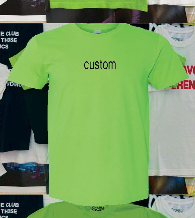 May include: A bright green t-shirt with the word "custom" printed in black on the front.