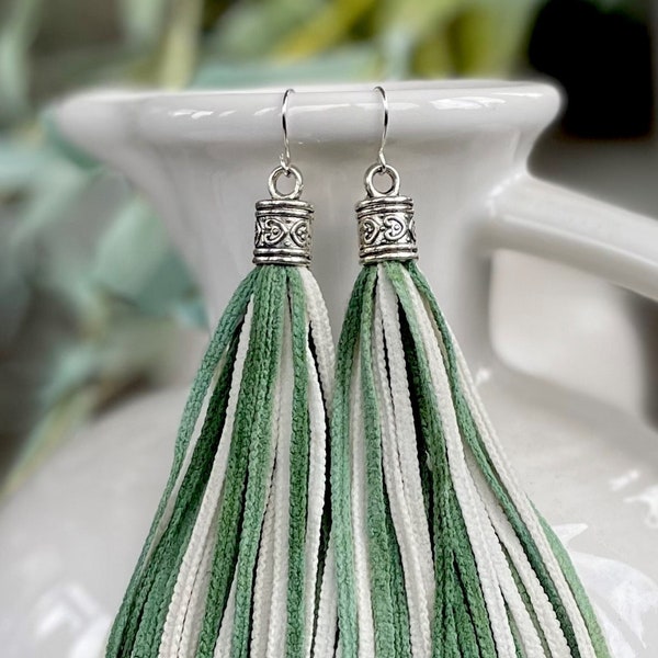 Green and white earrings.  Spirit wear for the NY Jets, Michigan State, Boston Celtics, Milwaukee Bucks, Dartmouth, OH University and more!