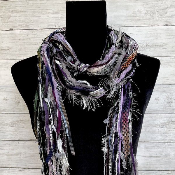 Womens unique, fun, lightweight boho fashion scarf in shades of purple, grey, green, black, silver and white.