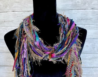 Womens scarf, fun, versatile, lightweight fashion scarf in shades of pink, blue, purple, gold, teal and red.